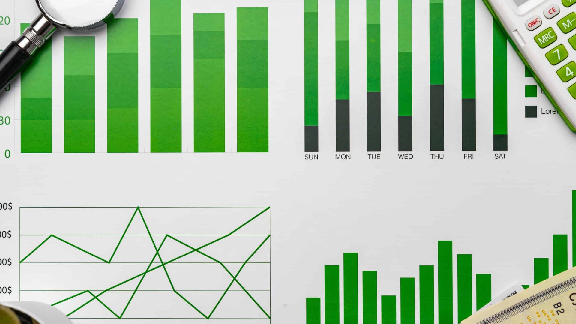 Financial paper with charts and diagrams on gray table top view